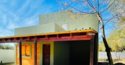 CASA A ESTRENAR CON TERRENO AMPLIO Y ACEQUIA- EXCELENTE UBICACION