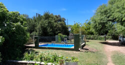 EXCELENTE PROPIEDAD CON AMPLIO TERRENO Y ACEQUIA