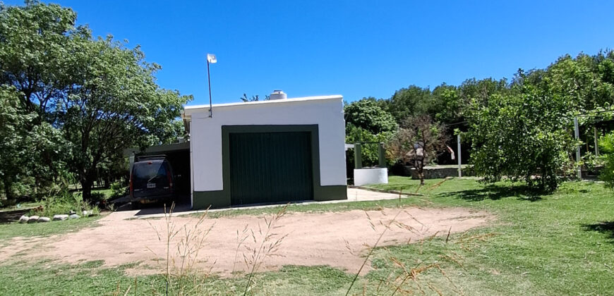 EXCELENTE PROPIEDAD CON AMPLIO TERRENO Y ACEQUIA