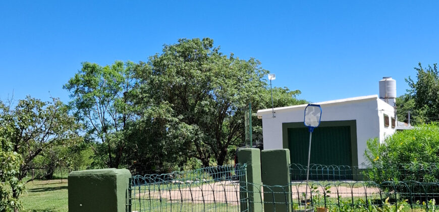 EXCELENTE PROPIEDAD CON AMPLIO TERRENO Y ACEQUIA